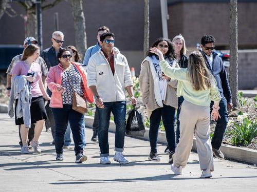 Hailey Bower leads a campus tour at PFW